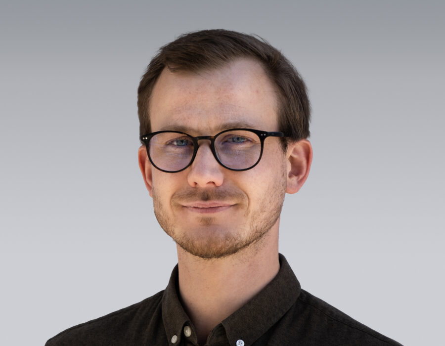 Headshot portrait of Marius